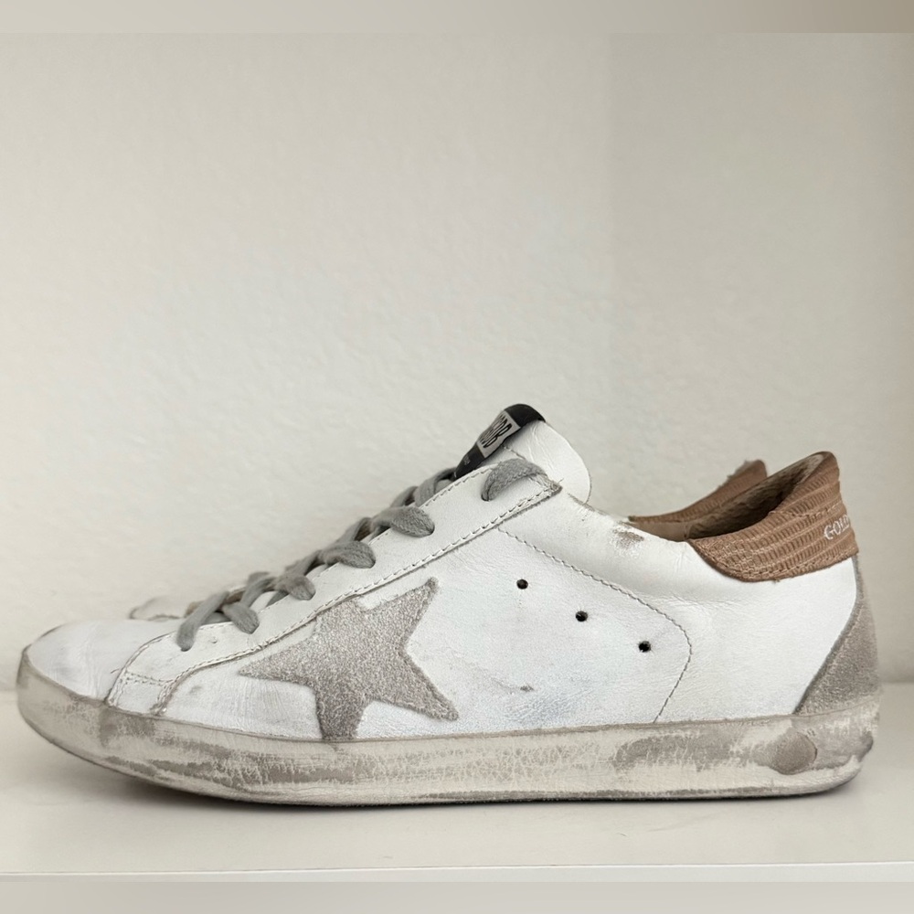 Golden Goose Women’s White and Gray Star Sneakers with brown lizard backing